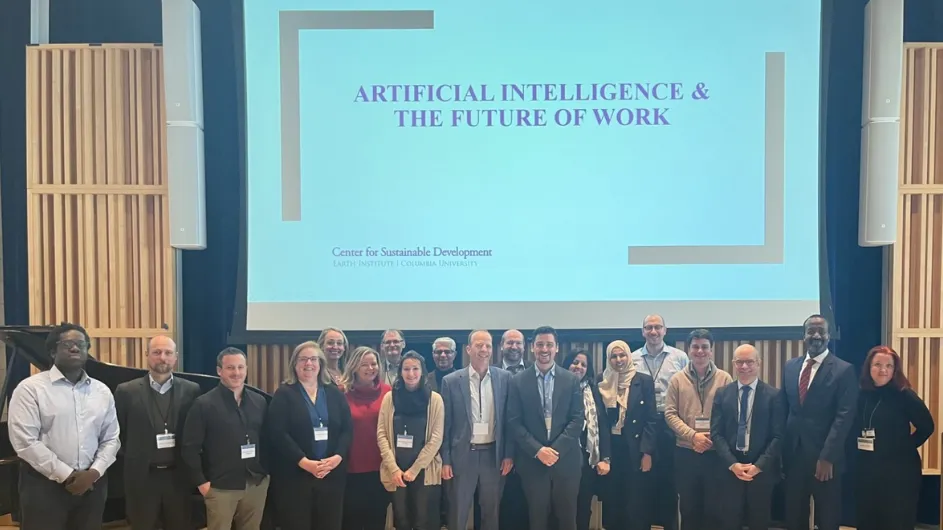 AI and the Future of Work team standing onstage