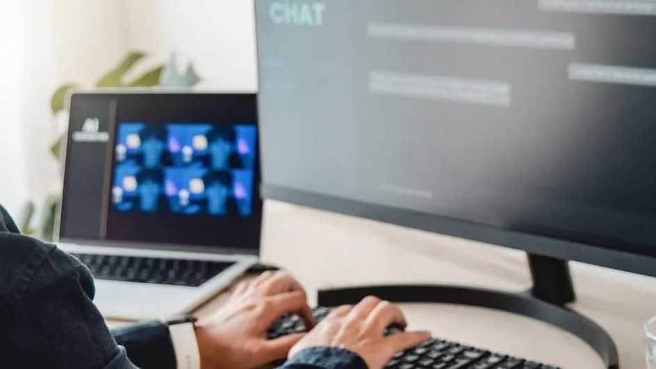 Hands typing on a keyboard 
