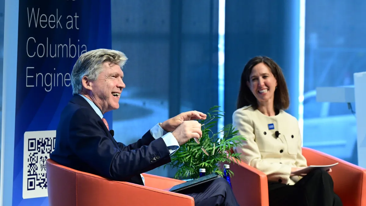 Alexander Sarrigeorgiou and Dean Alexis Abramson share a lighthearted moment during a fireside chat at Columbia Engineering’s Climate Week event.