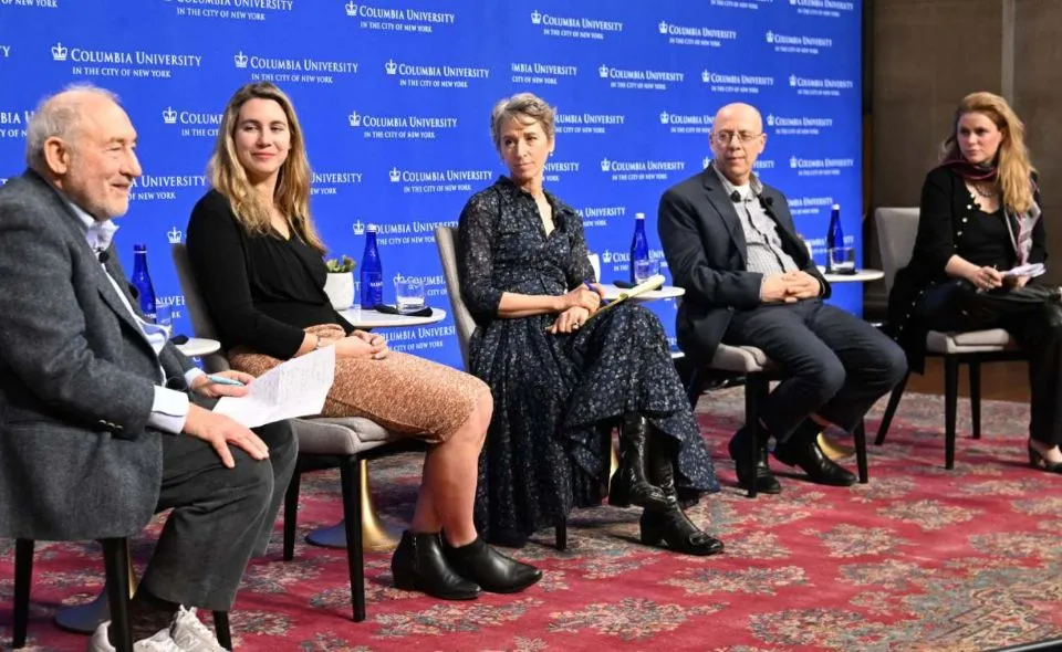 Five panelists onstage