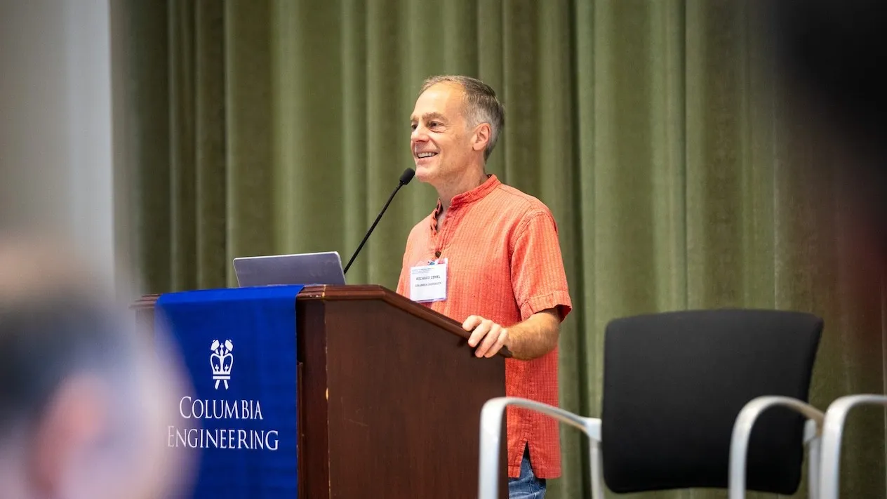 richard zemel speaking at podium