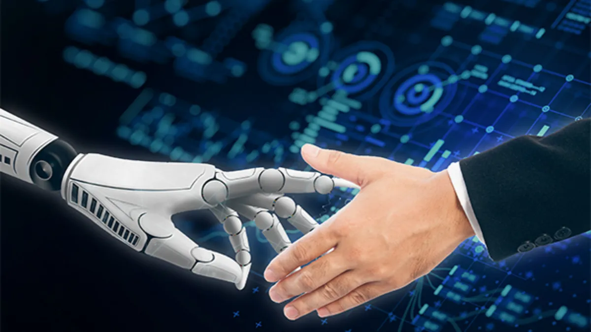 A robotic hand and a human hand reach toward each other against a futuristic digital interface, symbolizing collaboration between artificial intelligence and people.