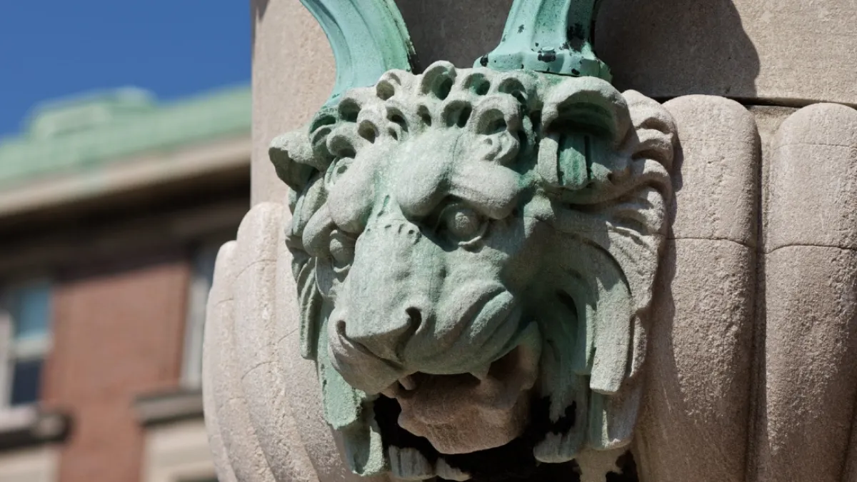 The picture has a green lion. 