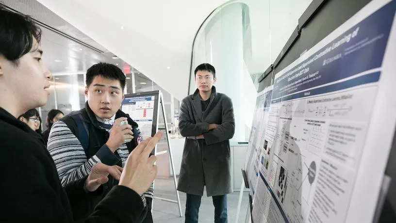 Attendees at the poster session. Credit: Timothy Lee