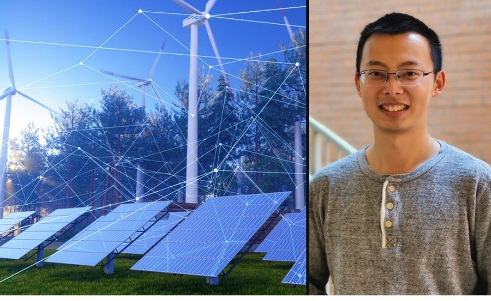 Bolun Xu alongside solar panels